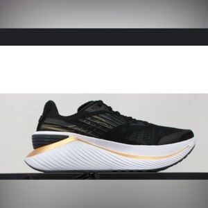 Preowned Saucony Black and Gold Athletic Shoes